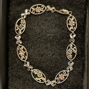 10K X & O Tri-Gold Love Bracelet with Rose Gold Flower